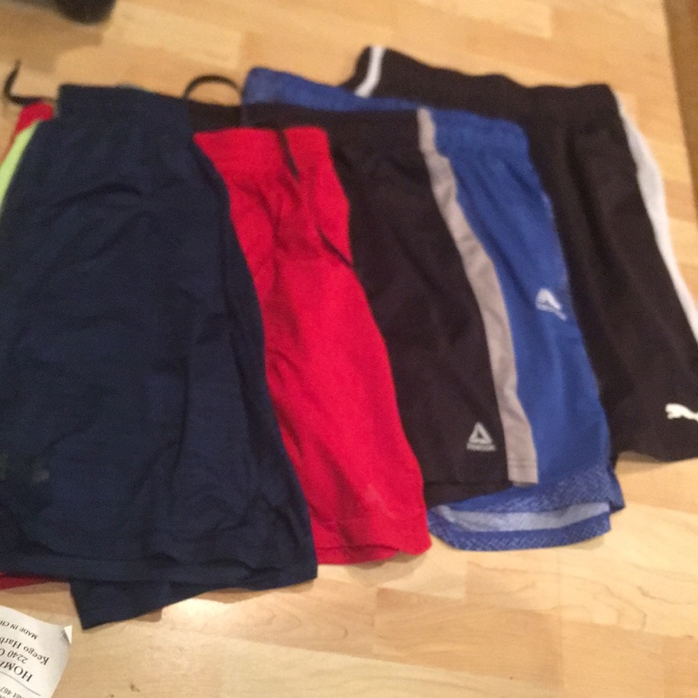 Lot of 5 medium athletic shorts. Mens sizes. Will fit teen boys as well:)